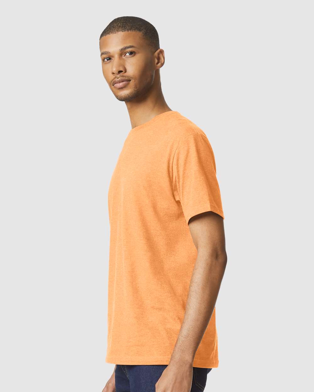 Gildan 64000CVC Unisex Softstyle® CVC T-Shirt - Tangerine Mist - On Model Side