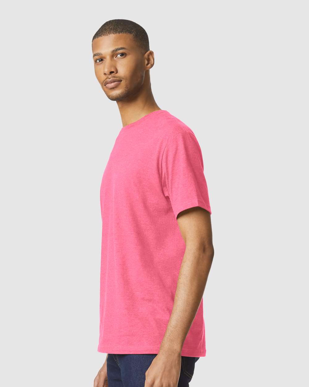 Gildan 64000CVC Unisex Softstyle® CVC T-Shirt - Pink Lemonade Mist - On Model Side