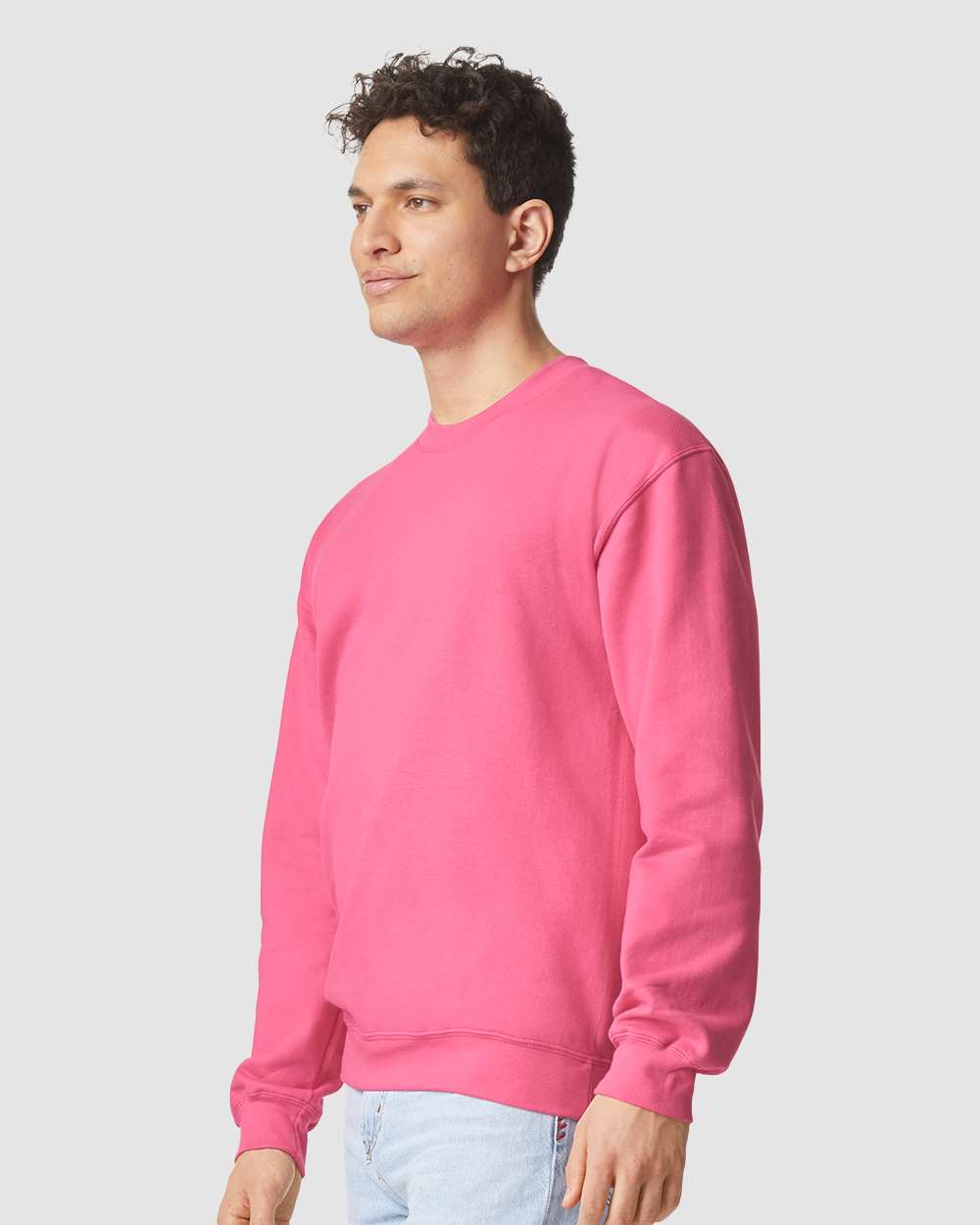 Gildan SF000 Unisex Softstyle® Midweight Crewneck Sweatshirt - Pink Lemonade - On Model Side