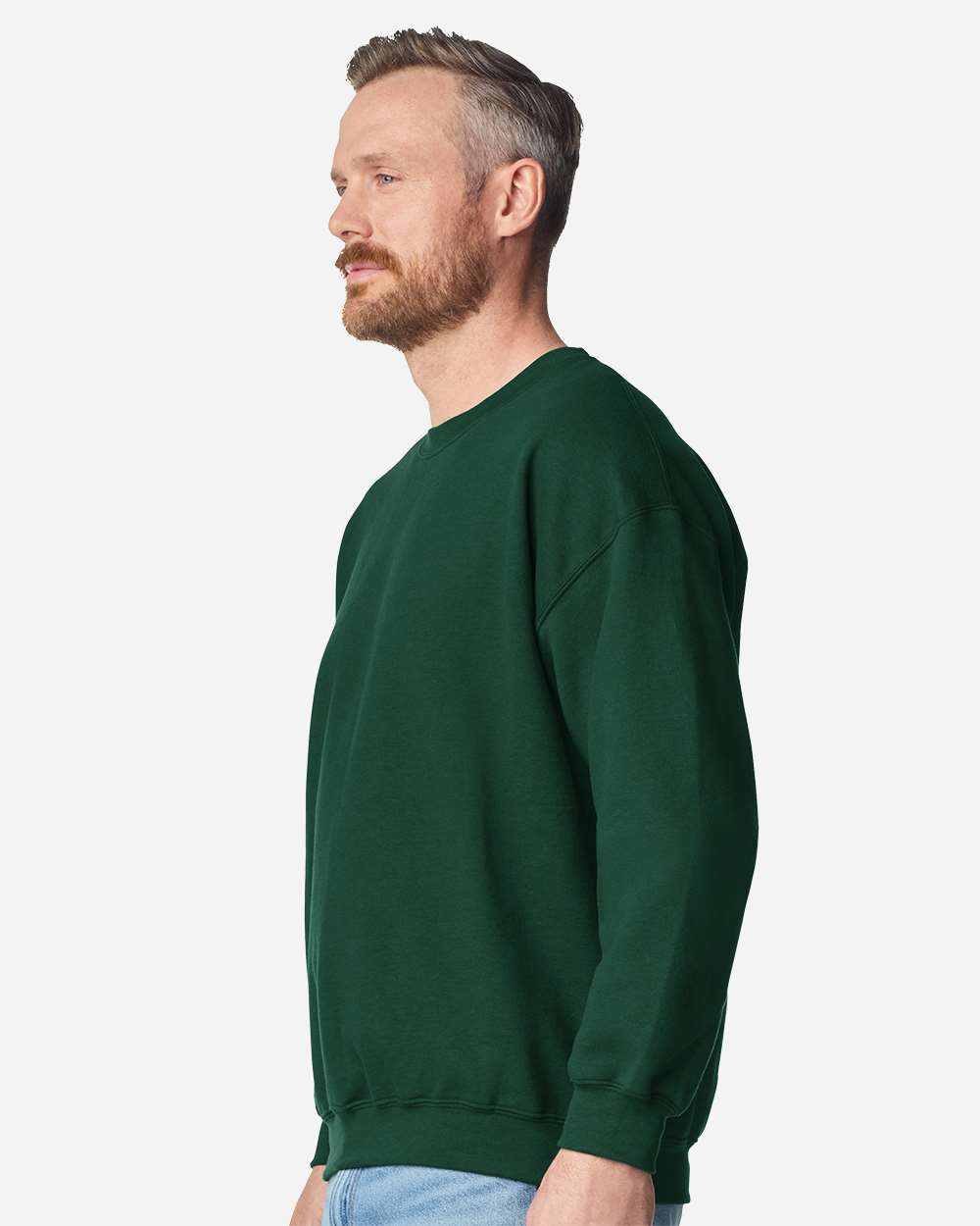 Gildan 18000 Unisex Heavy Blend™ Crewneck Sweatshirt - Fan Dark Green - On Model Side