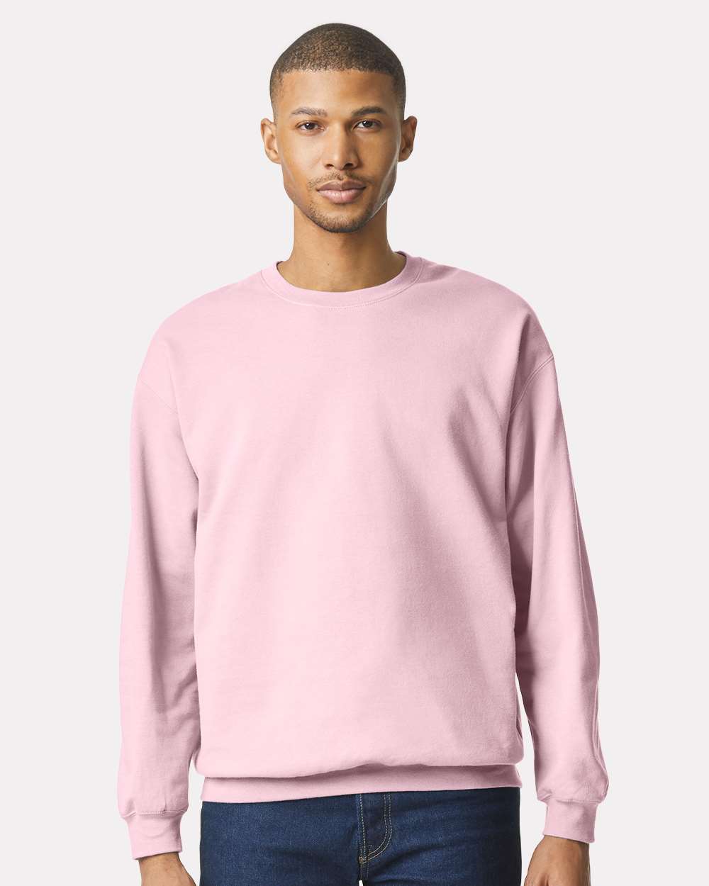 Gildan SF000 Unisex Softstyle® Midweight Crewneck Sweatshirt - Light Pink - On Model Front
