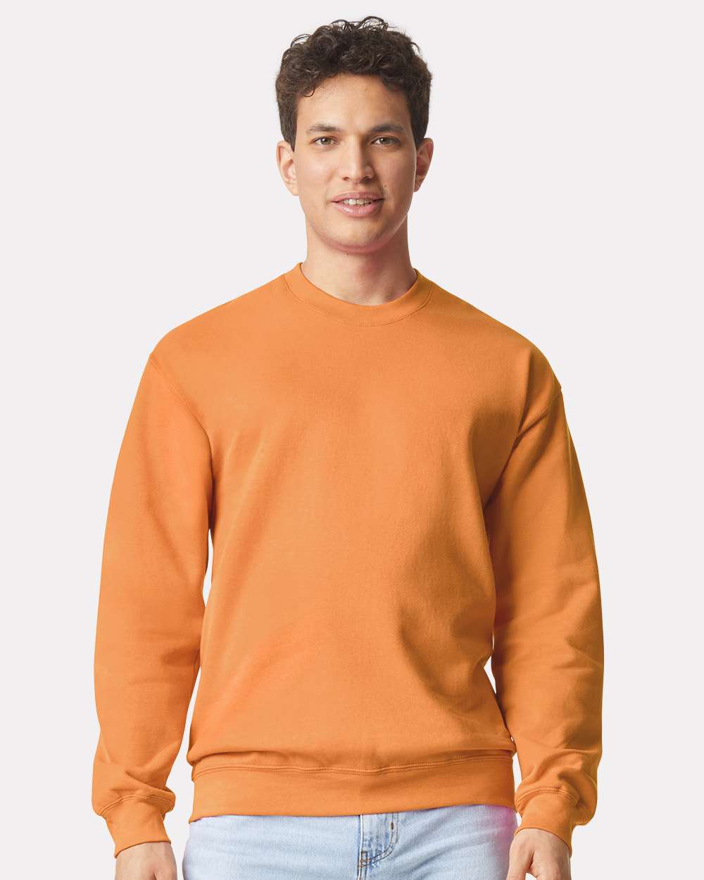 Gildan SF000 Unisex Softstyle® Midweight Crewneck Sweatshirt - Tangerine - On Model Front