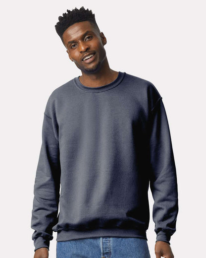 Gildan 18000 Unisex Heavy Blend™ Crewneck Sweatshirt - Heather Dark Navy - On Model Front