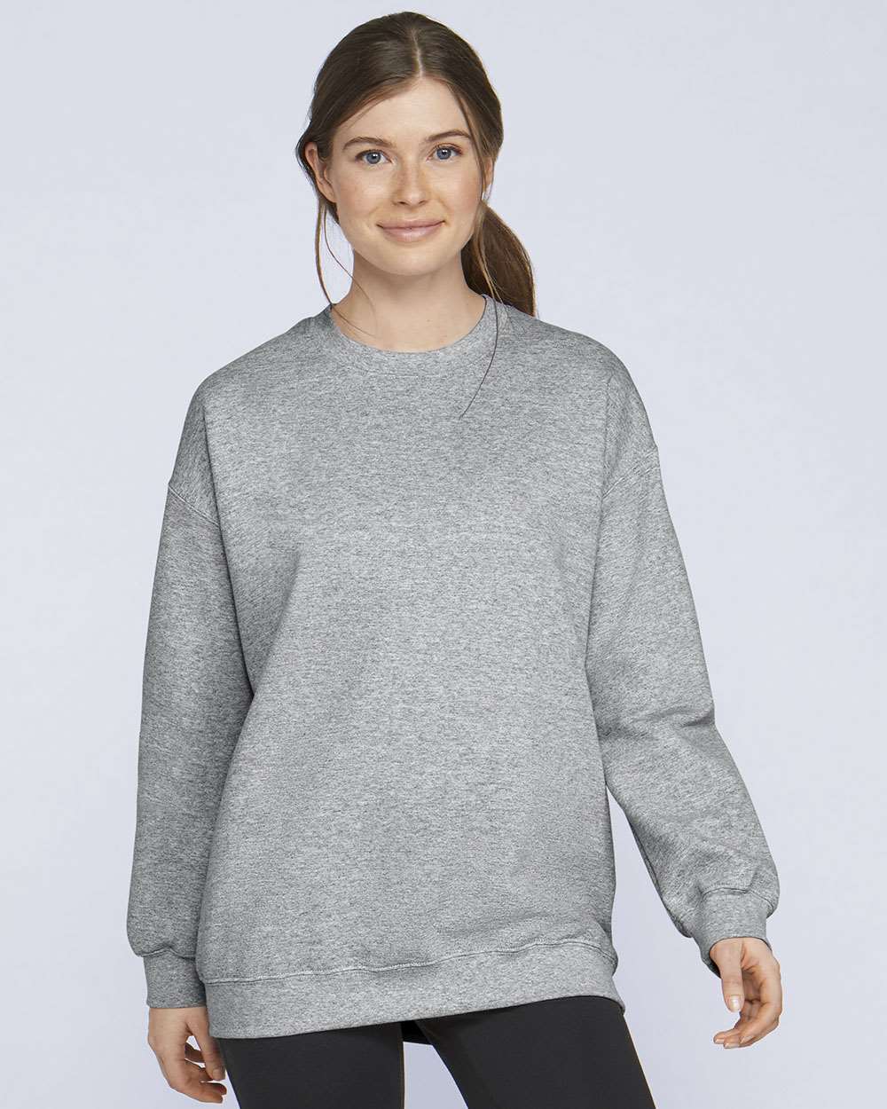 Gildan SF000 Unisex Softstyle® Midweight Crewneck Sweatshirt - Sport Grey - On Model Front