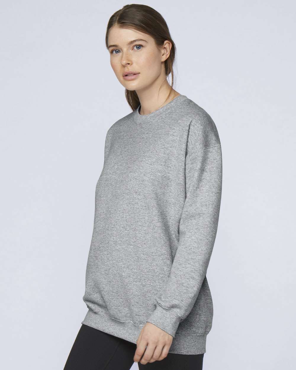 Gildan SF000 Unisex Softstyle® Midweight Crewneck Sweatshirt - Sport Grey - On Model Side